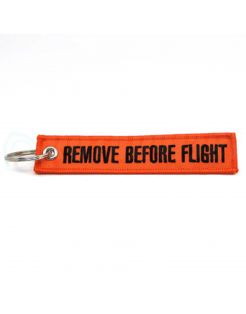 Llaveros Remove Before Flight naranja.