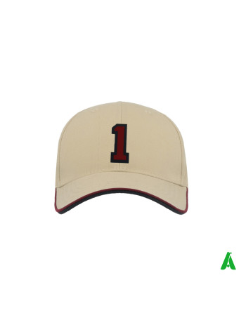 A beige cap with a peak, personalised with the number 1 embroidered onto felt and sewn on.