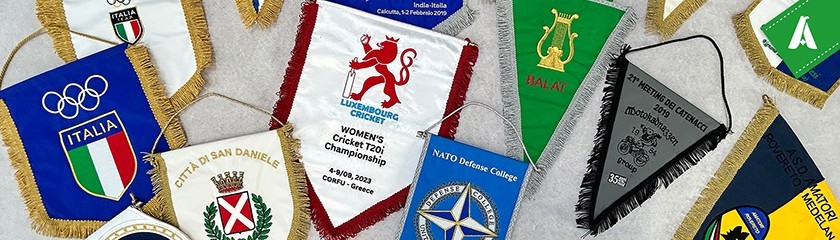 Custom pennants with fringe and support accessories by | Arem Italia